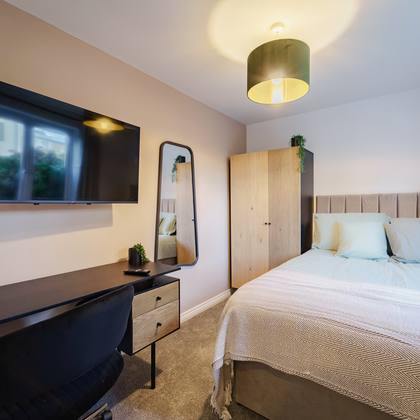 Room 1, desk and TV