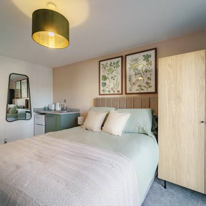 Room 3, double bed and kitchenette